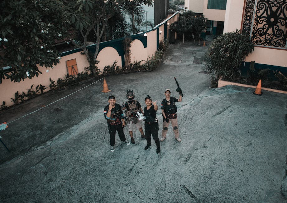 Open world action game - Four people enjoying outdoor airsoft game